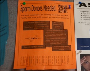 Posters advertising a sperm donation company have been posted around campus.  Father John Malone says the posters are indecent and go against the teachings of the Catholic church.  (Briggs LeSavage/TommieMedia)   