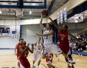 01112010_BBALL_Hays003 Senior Joe Scott attempts a layup during the Jan. 11 game against St. Mary's. (Aaron Hays/TommieMedia)
