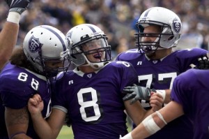 Junior running back Ben Wartman celebrates a score against Gustavus Oct. 3. The Tommie football team hopes it'll be celebrating an NCAA playoff berth this Sunday, the first since 1990. (Josh Kleven/TommieMedia)