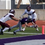091031_FootballVsAug_JDK003 Fritz Waldvogel and the Tommies ran all over Augsburg in the 42-3 win. (John Kruger)