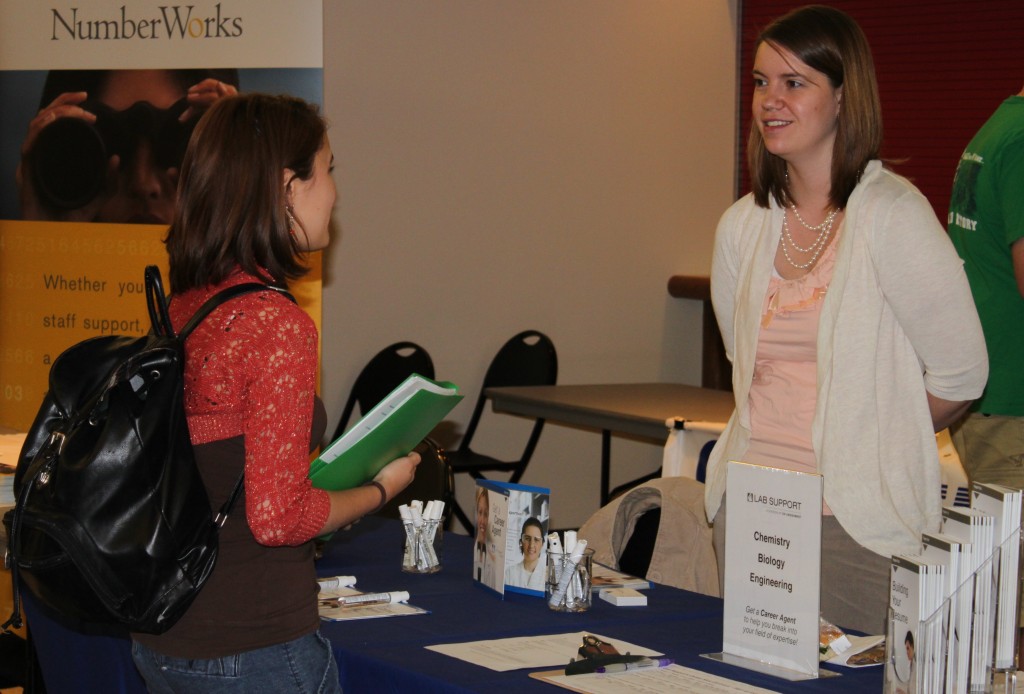 Students talked with employers and looked for jobs Tuesday at the