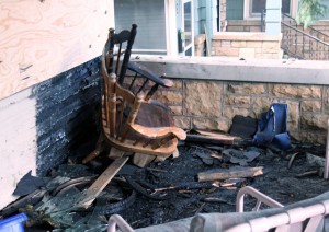<p>Most fire damage Friday night was limited to the porch of a house inhabited by St. Thomas students at 1810 Marshall Ave., St. Paul. Fire Marshal Steve Zaccard blamed smoking as the cause of the fire and estimated damage at $15,000. (Briggs LeSavage/TommieMedia)</p> 