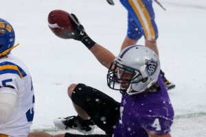 <p>Senior wide receiver Fritz Waldvogel is all smiles in the snow against St. Scholastica last weekend. Waldvogel has 12 touchdowns, 1,418 all-purpose yards and 61 receptions for 940 yards in 11 games this season. (Rita Kovtun/TommieMedia)</p>