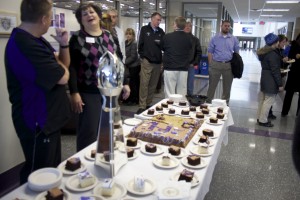 The St. Thomas community gathered to honor coach Glenn Caruso. His coach of the year trophy was on display, and cake was provided. (Cynthia Johnson/TommieMedia)