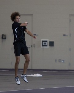 Senior Daniel Cooper gets some air during Saturday's match. (Caroline Rode/TommieMedia)