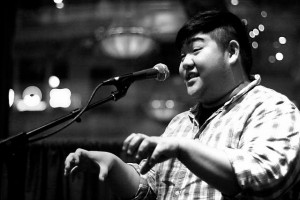 <p>Heiu Minh Nguyen performs an original poem. Nguyen compared poetry competitions to "the competition of playing tag with your friends." (Submitted Photo)</p>