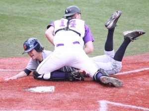 <p>Sophomore catcher J.D. Dorgan blocks the plate in a game against St. Olaf last season. Dorgan is one of the Tommies key players returning in 2012. (Alex Keil/TommieMedia)</p> 