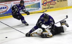 120307_NCAA_MEN_HOCKEY <p>Alex Altenbernd slows a St. Norbert player so teammate Matt Lipinski can get to the puck. Altenbernd was named to the MIAC all-rookie team along with defenseman Michael Krieg in 2012. (Jake Swansson/TommieMedia)</p>