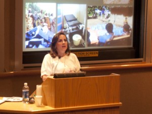 Amy Ernst, volunteer rape crisis counselor, describes her work in the Congo with rape survivors and perpetrators on Monday, April 2, in the 3M Auditorium. (Amanda Ogbuehi/TommieMedia)