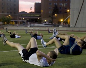 120404_ROTC <p>ROTC students do crunches during their morning workout. Morrison residents have complained that ROTC students purposely try to wake them up. (Aaron Hayes/TommieMedia).</p>