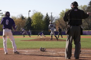 Junior shortstop Jon Kinsel watches teammate Jack Hogan steal second during the second game. Kinsel picked up an RBI later in the at bat, scoring St. Thomas' first run. (Anastasia Straley/TommieMedia)