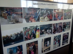 This board displays the Top 15 pictures from fall semester of students who were exempt from having to present their final project. (Kristopher Jobe/TommieMedia)