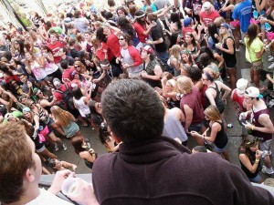 120502_MIFFLIN Students overlook the block party from a balcony on Mifflin Street. Horsager said that Mifflin is "a way of life at Madison." (Photo courtesy of Dustin Klitzke)