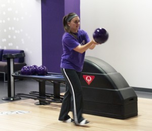 Freshman Bailey Schirmers takes a look down the lane before releasing the bowling ball. ‪Cosmic bowling and a bowling league contributed to the success of the Anderson Student Center's bowling alley this semester. (Baihly Warfield/TommieMedia)