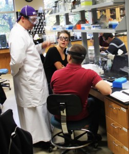 <p>Friar Patrick Daniel Tobin instructs a biochem lab in his full Dominican habit. Tobin holds two positions at St. Thomas: in campus ministry and one as a chemistry professor. (Kayla Bengtson/TommieMedia)</p> 