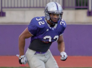<p>Junior outside linebacker Tremayne Williams stands ready in last week's game against Gustavus. St. Thomas will face off against ninth-ranked Bethel University Saturday, Oct. 13, at O'Shaughnessy Stadium. (Alex Goering/TommieMedia)</p> 