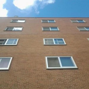 <p>Dowling Hall's windows appear uniform after Residence Life decided to ban decorations visible to the public. The ban became effective Saturday, Sept. 29. (Anastasia Straley/TommieMedia)</p> 