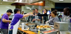 <p>T's Restaurant employees serve lunch to students and faculty. Since there has been a surge in business, many customers leave frustrated with the slow moving lines. (Rosie Murphy/TommieMedia)</p>