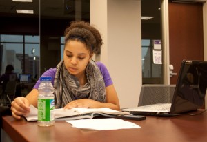 121024_dease_Full <p>Senior Dease Scholar Kia Johnson studies in the Anderson Student Center Tuesday. There have been no plans to change the Dease Scholar Program in 2013 after the Rev. Dennis Dease leaves. (Gabrielle Martinson/TommieMedia)</p>