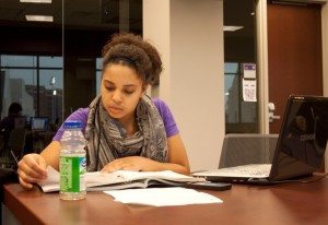 <p>Senior Dease Scholar Kia Johnson studies in the Anderson Student Center Tuesday. There have been no plans to change the Dease Scholar Program in 2013 after the Rev. Dennis Dease leaves. (Gabrielle Martinson/TommieMedia)</p> 