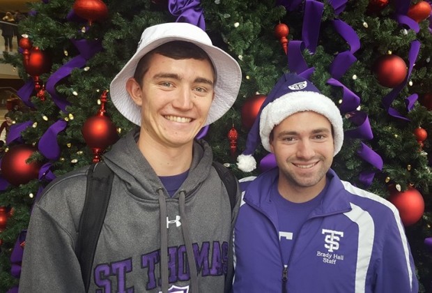Junior Zach Lang (left) and senior Louis Missurelli (right) created a Facebook page called "You Made My Day." Members of the page answered requests that students said would make their day. (Genevieve Gates) 