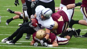 <p>Freshman running back Brenton Braddock propels toward the end zone. Braddock scored the Tommies' third touchdown against the Cobbers. (Rosie Murphy/TommieMedia) </p> 