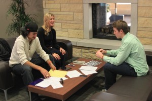 <p>(From left to right) Sophomore David Zosel, Sara Londo and Patrick Larkin meet to discuss their business development for their project called The Lemon Network. The goal for the project is to run social media for local businesses. (Laura Landvik/TommieMedia)</p>