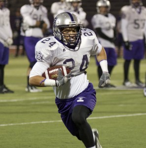 <p>Running back Brenton Braddock carries the ball at practice Tuesday in preparation for Saturday's game against Hobart. Braddock needs 86 yards to reach 1,000 rushing yards for the season. (Ross Schreck/TommieMedia)</p> 