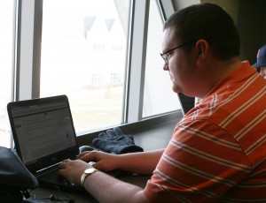 <p>Senior Jake Cordes checks his email in the Anderson Student Center Wednesday. Cordes is one of the youngest officeholders in Minnesota after being elected to the Farmington school board in November. (Gabrielle Martinson/TommieMedia)</p> 