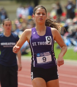 <p>Junior Taylor Berg warms up before her 1,500-meter race. Berg ran 4:30.53 to place seventh in the nation Saturday, May 26. (Hannah Anderson/TommieMedia)</p>