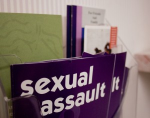 Sexual assault information pamphlets sit in both the women's and men's bathrooms throughout St. Thomas' St. Paul campus. The pamphlets provide resources to students who have experienced or know someone who has experienced sexual assault. (Gabrielle Martinson/TommieMedia)