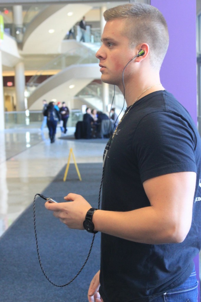 <p>Junior Clay DeNicola listens to his music through the noise canceling headphones he designed. The customized headphones have sold for $150 or $200 plus tax. (Bjorn Saterbak/TommieMedia)</p> 