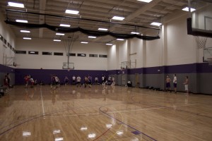Students participate in a intramural basketball game. There are 98 basketball teams this spring, including five-on-five and four-on-four co-ed leagues. (Jesse Krull/TommieMedia)
