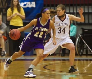 <p>Forward Taylor Young looks to drive past foward Courtney Kurncz in last season's Elite Eight game. The Tommies defeated the Knights in overtime, earning a spot in the Final Four. (Cynthia Johnson/TommieMedia)</p> 