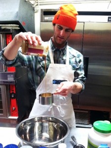 Senior Spencer Brendel prepares his ATHLEATS Trail Mix. Brendel founded PlayHard GiveBack, a company designed to help athletes give back to their communities. (Courtesy of Jeff Brendel)