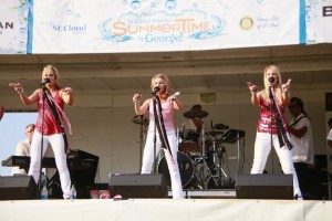 Belladiva vocalists Maria Stukey, Lisa Pallen and Lisa Marie Furth perform last August in St. Cloud, Minn. Some of the musicians in the band have toured with national acts, including Prince. (Photo courtesy of Belladiva)