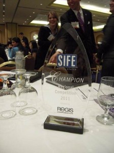 St. Thomas students celebrate winning the SIFE Regional Competition in 2012. While the organization has changed its name to Enactus, St. Thomas members are looking for their fourth consecutive win. (Photo courtesy of Betsy Lofgren)