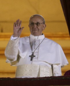<p>Pope Francis waves to the crowd from the central balcony of St. Peter's Basilica at the Vatican, Wednesday, March 13, 2013. Cardinal Jorge Bergoglio who chose the name of Francis is the 266th pontiff of the Roman Catholic Church. (AP Photo/Gregorio Borgia)</p>