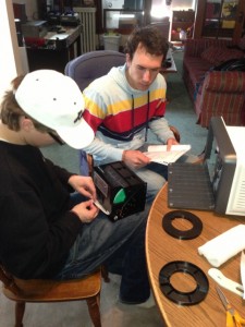 Founders Connor Flood and Joseph Zangel work on their newly launched business, Primetime Party Pix. The sophomores started their company in January and hope to become an entertaining way for St. Thomas students to document their nights. (Maggie Whitacre/TommieMedia)