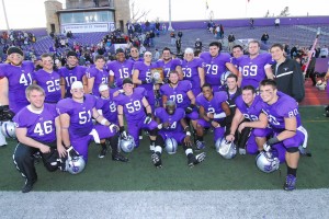 The 2012 St. Thomas football seniors pose with the MIAC conference trophy after defeating St. Olaf 35-21 Nov. 10, 2012. The senior players said they were looking to utilize Tommie football alumni to find employment opportunities after graduation. (Courtesy of Tyler Erstad)