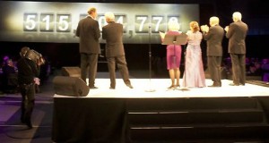 From left to right: Dr. Mark Dienhart, the Rev. Dennis Dease, Susan Morrison, Maureen Schulze, Richard Schulze and John Morrison applaud as the final tally is announced at the Capital Campaign Celebration last fall. The campaign exceeded its $500 million goal. (Gabrielle Martinson/TommieMedia)