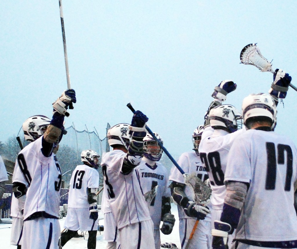 The Tommies celebrate their 23-1 win over the Oles. St. Thomas is undefeated this season and ranked number one in the nation. (Whitney Abrahamson/TommieMedia)