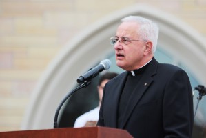 The Rev. Dennis Dease speaks at his farewell celebration Thursday. Dease will give the undergraduate commencement address at St. John's University May 12. (Rita Kovtun/TommieMedia)