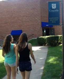 Two students walk through Concordia's St. Paul campus. The institution lowered tuition by 10,000 for the current school year. (Johnnay Leenay/ TommieMedia) 