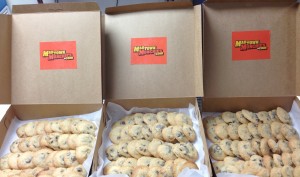 Madtown Muchies owner Jeremy Neren displays some of the newly available cookies made fresh to order. His bike-delivery business targeting college students started in Madison in 2006 and now he has opened a St. Paul new location near St. Thomas' campus. (Joey Anderson/ TommieMedia) 