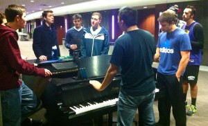 The Summit Singers practice for their Christmas concert near the Wolfe Alumni Center. The group qualified as an exception to the exclusive club funding guidelines and received $1,300 from USG for this concert. (Kayla Bengtson/TommieMedia) 