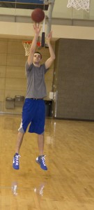 Junior Ryan Forsman practices his jump shot in the Anderson Athletic and Recreation Center. Forsman said court time during the winter months has been scarce from winter and spring activities having to practice indoors. (Trevor Walstrom/TommieMedia)