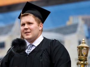 Tommie Award winner Matthew Sullivan speaks at the 2012 undergraduate commencement ceremony. Tommie Award winners will no longer be required to speak at commencement. (Photo courtesy of Mike Ekern/ University Relations)