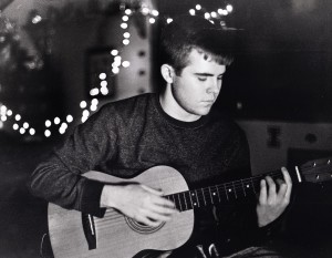 Sophomore Erik Nielsen plays the guitar. Nielsen died Dec. 9 after suffering a brain aneurysm. (Courtesy of the Nielsen family)