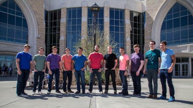 Members of the Summit Singers stand in front of the Anderson Student Center. The men's a capella group will release its first album Wednesday. (Photo courtesy of summitsingers.com) 
